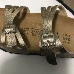 Birkenstock Birki’s Gold Sandals with stones on buckle